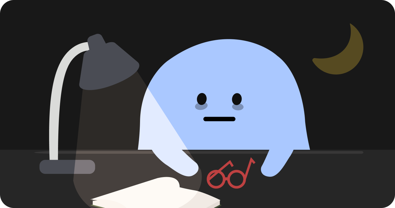 机で徹夜している様子