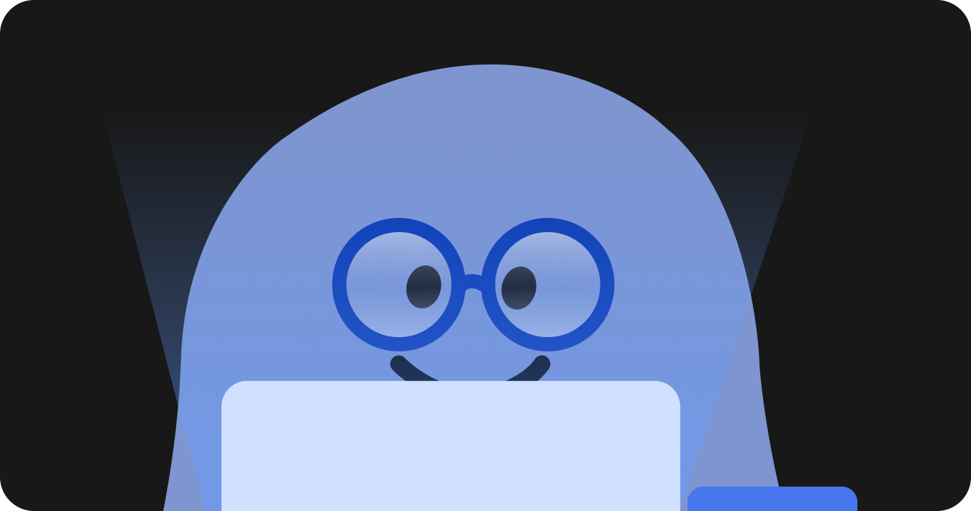 パソコンを使いながらブルーライトカット眼鏡をかけている人