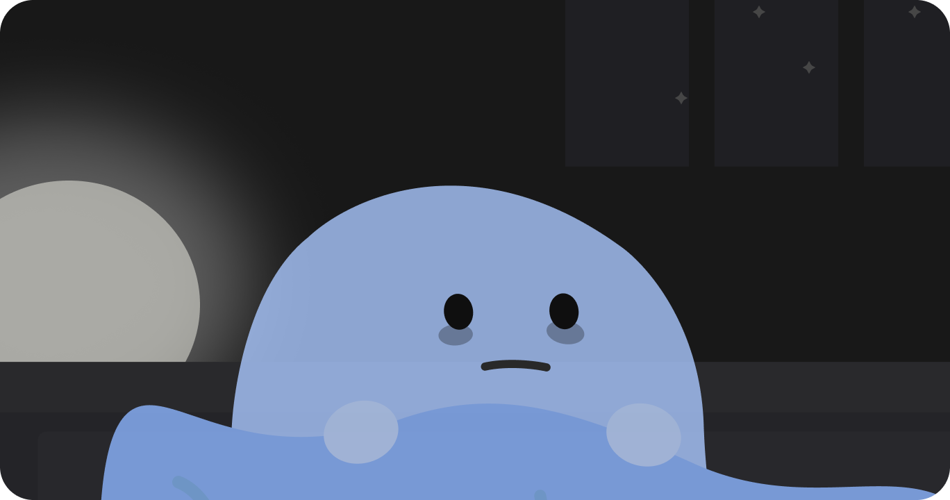 夜、ベッドで眠れずに横たわる人